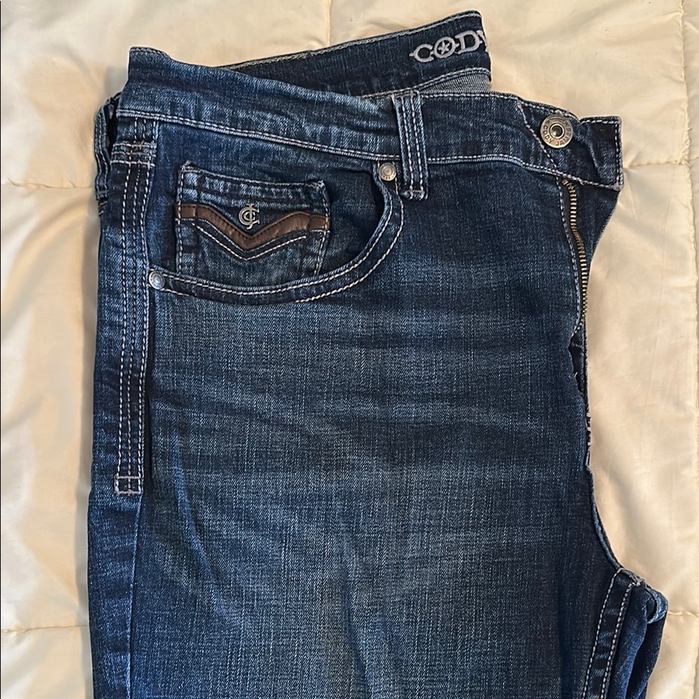 Relaxed Blue Jeans with Distinctive Stitching and Quality Denim